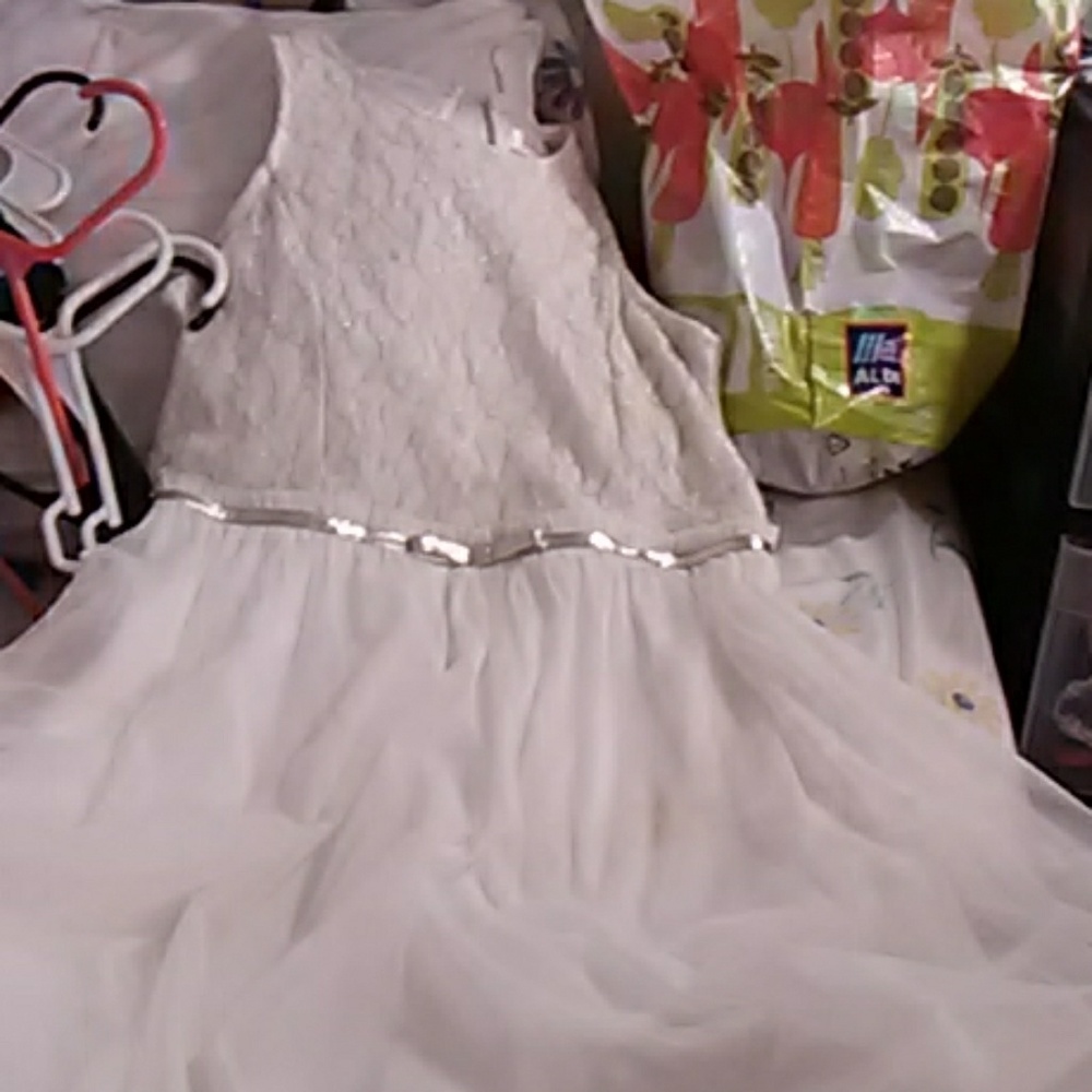 A white dress with gold details